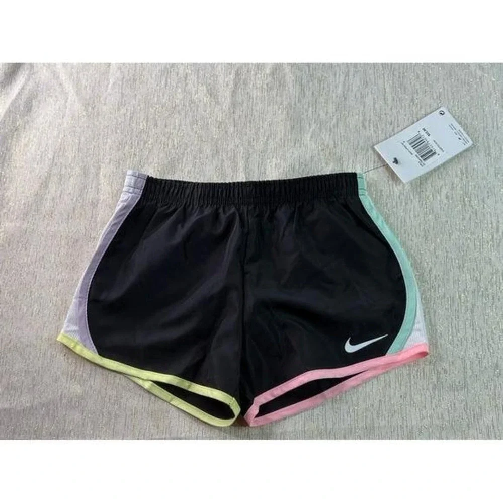 Three pairs of kids Nike dri fit short size 6